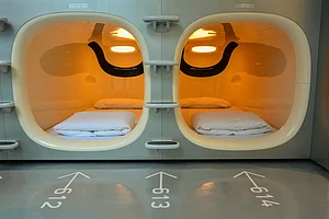 Shutterstock : Capsule hotels may be low on space but can cut down your expenditure